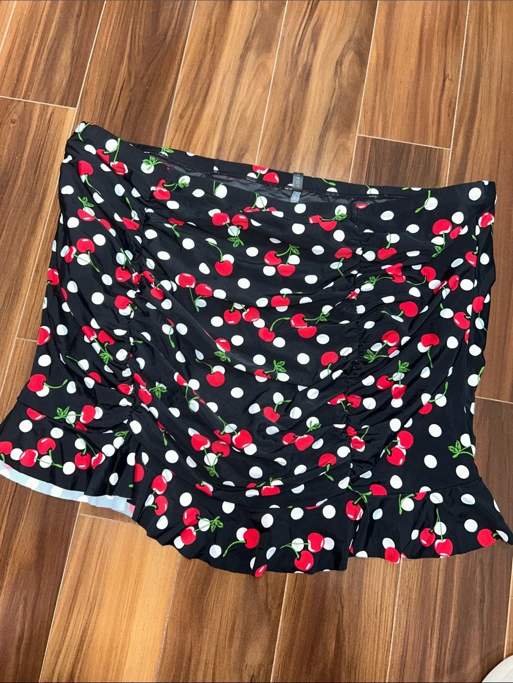 Size 4 Torrid Swim skirt cherry polka dot print